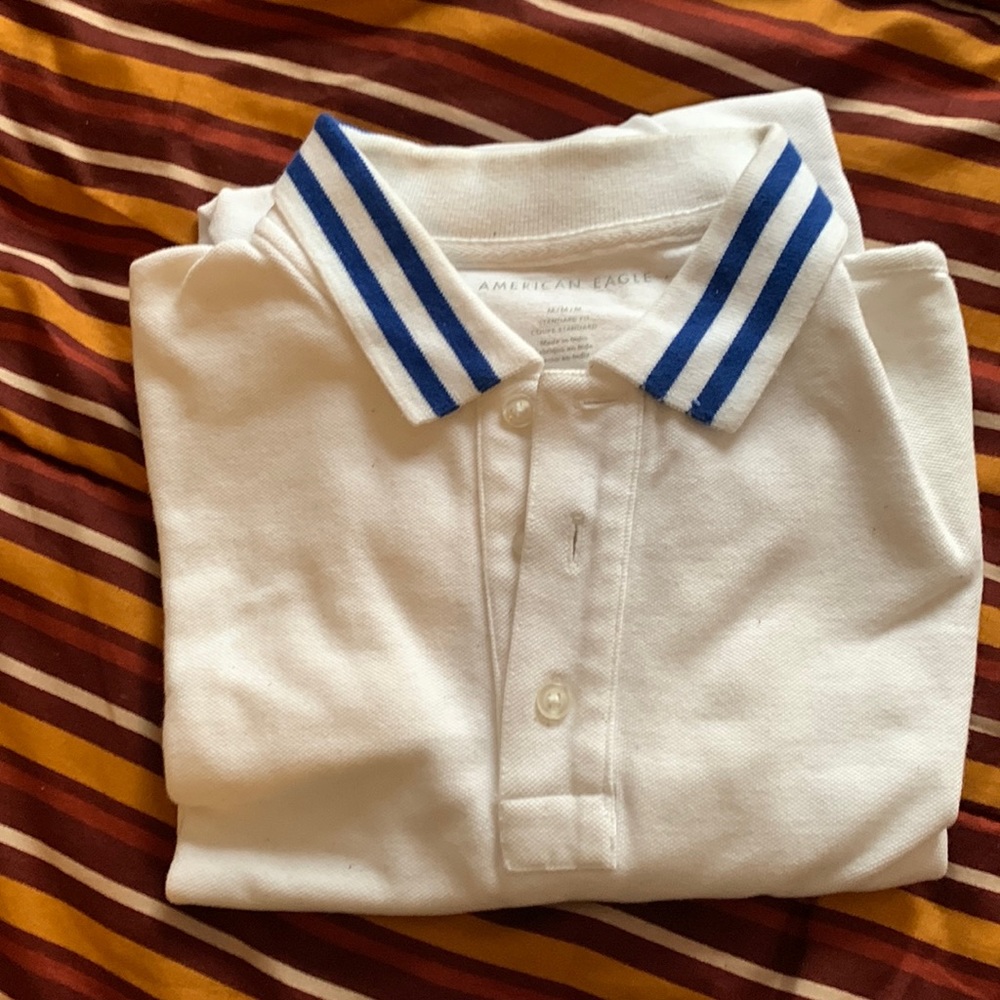 White polo shirt with collar  blue strips